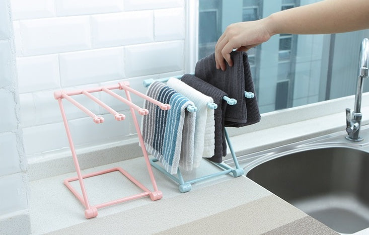 Kitchen sink towel rack